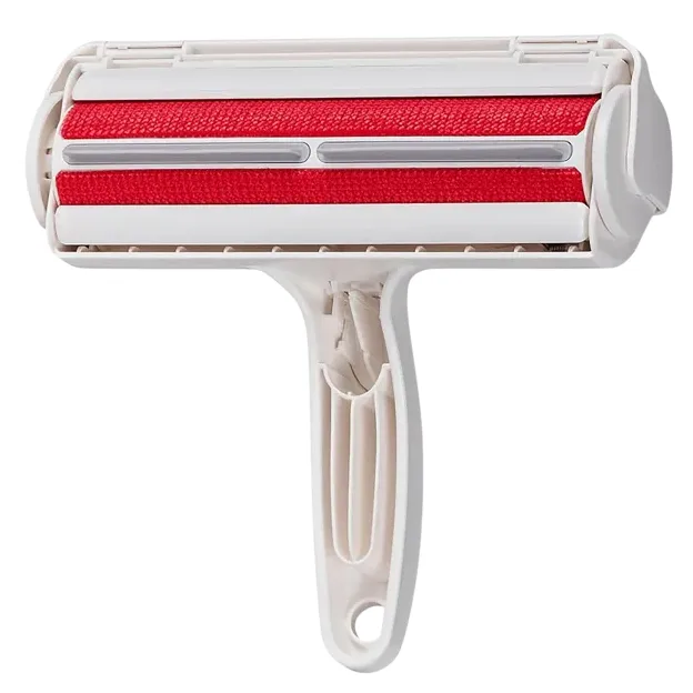 This is a handheld pet hair roller with a red fabric surface and white plastic frame, designed to remove lint and pet hair from surfaces. It features a sturdy handle for easy grip and maneuverability.