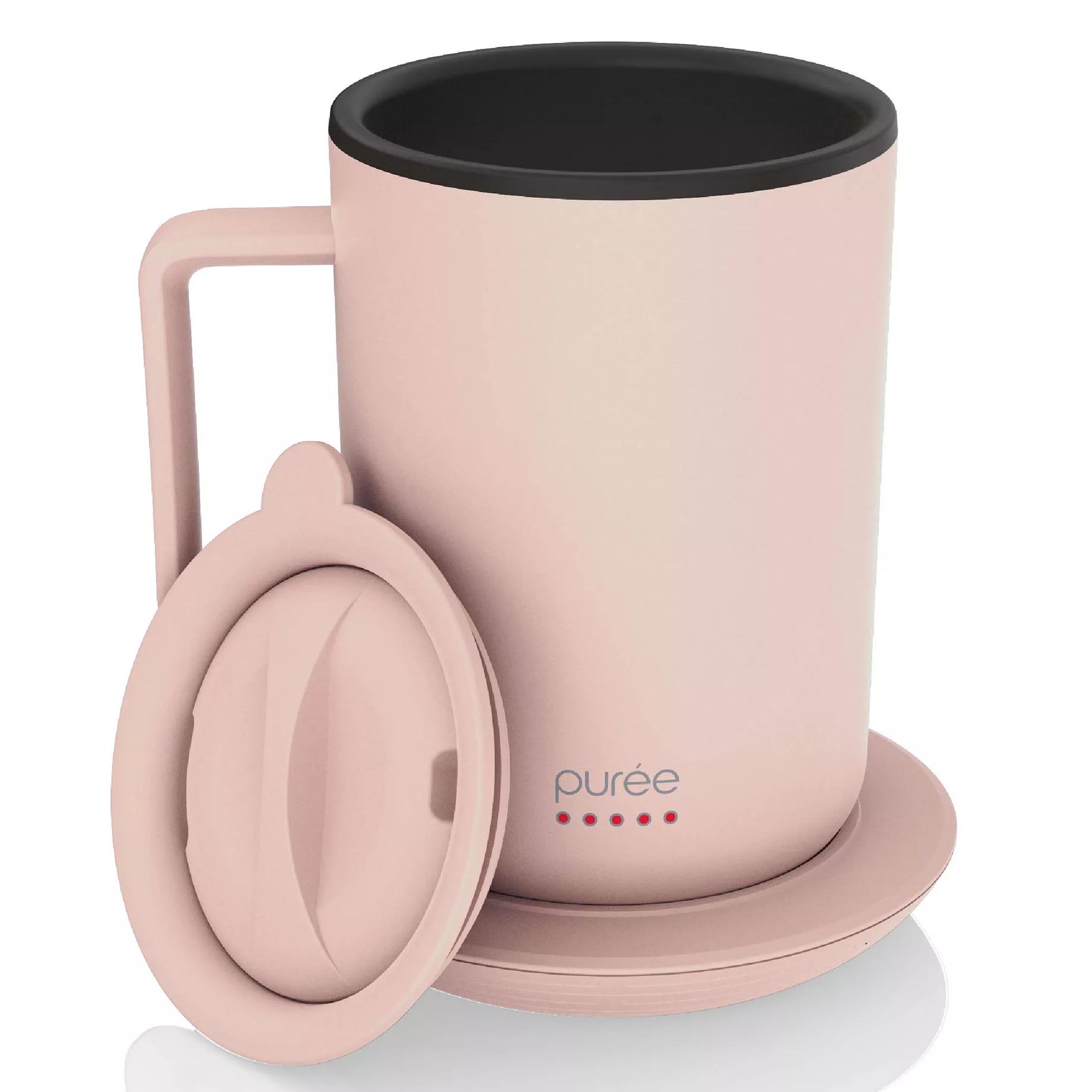A pink mug with a handle and lid, labeled \“purée\“ with red dots, featuring a black interior.