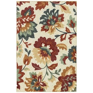 A decorative rug with an intricate floral pattern featuring red, green, and beige tones against a light background.