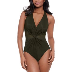 The Miraclesuit Wrapture Swimsuit is an olive green one-piece featuring a plunging neckline and ruched detailing at the waist for a flattering fit. It provides full bottom coverage and is designed with wide straps for added support.