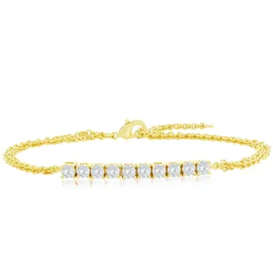 Gold bracelet with a row of round-cut diamonds.