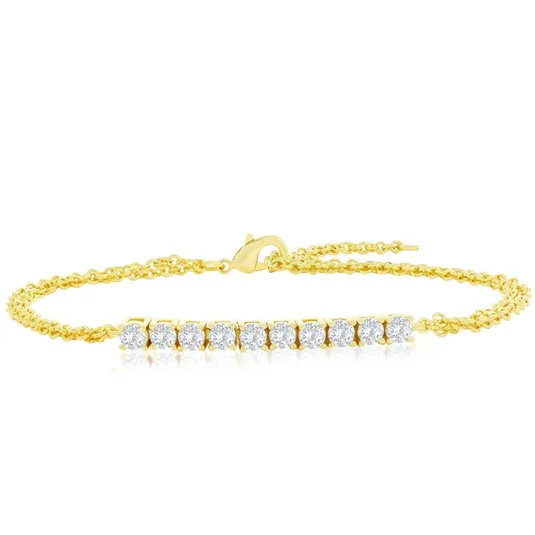 Gold bracelet with a row of round-cut diamonds.