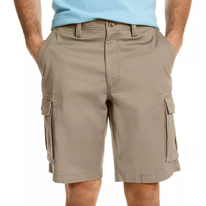 Khaki cargo shorts with belt loops and side pockets, worn with a light blue shirt.