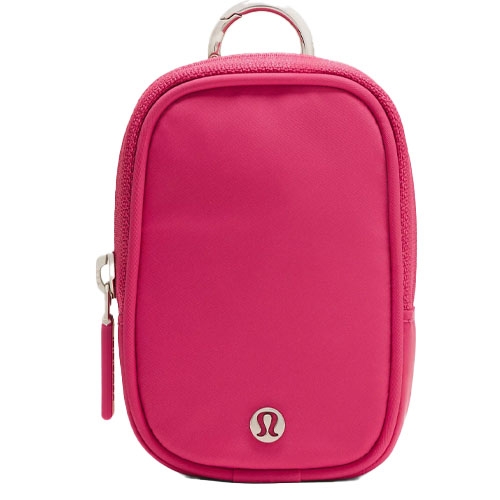 A small, rectangular pink pouch with a zip closure, featuring a silver logo on the front.