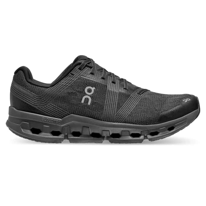 A black running shoe with distinctive sole design and the On logo on the side.