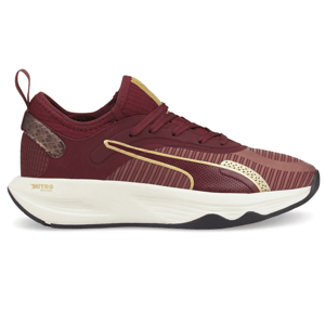 Maroon athletic shoe with a white and black sole, featuring gold accents and a visible logo.