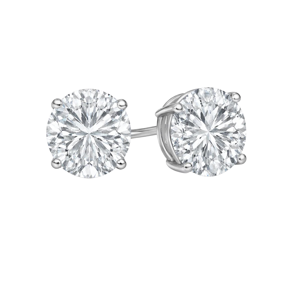 A pair of round, sparkling diamond stud earrings set in a metal prong setting.