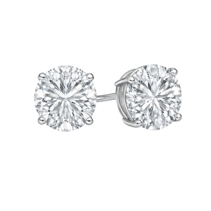 A pair of round, sparkling diamond stud earrings set in a metal prong setting.