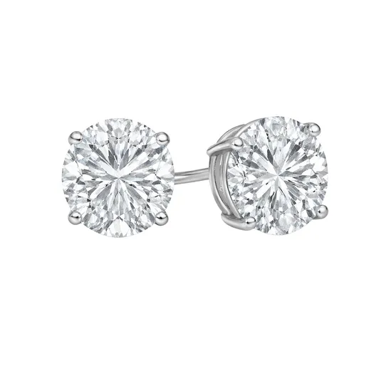 A pair of round, sparkling diamond stud earrings set in a metal prong setting.