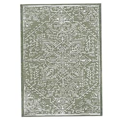 A rectangular area rug with an intricate, symmetrical geometric pattern in shades of gray and white.