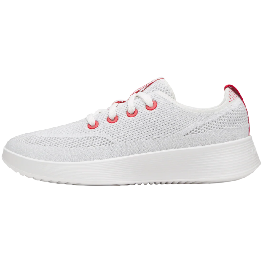 White mesh sneaker with red accents, featuring white laces, red eyelets, and a textured white sole.