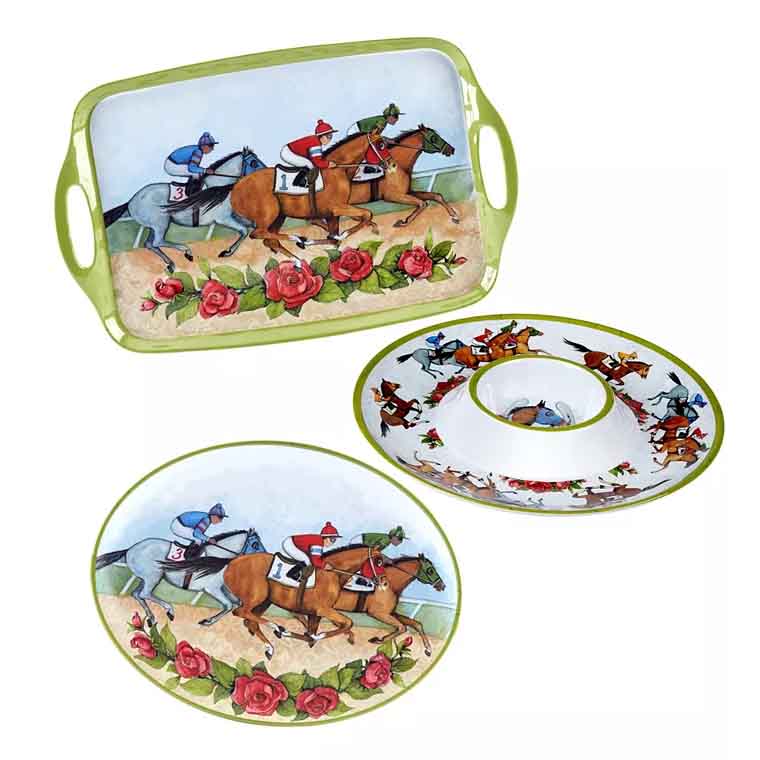 The Derby Day at the Races Serving Set includes a tray, oval dish, and a divided platter, featuring colorful illustrations of horse racing and adorned with roses and green trim.
