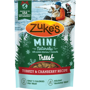 Zuke's Mini Naturals Trees Turkey & Cranberry Recipe dog treats, crafted in the USA, contain added vitamins and minerals, have only 2 calories per treat, and are suitable for holiday training.