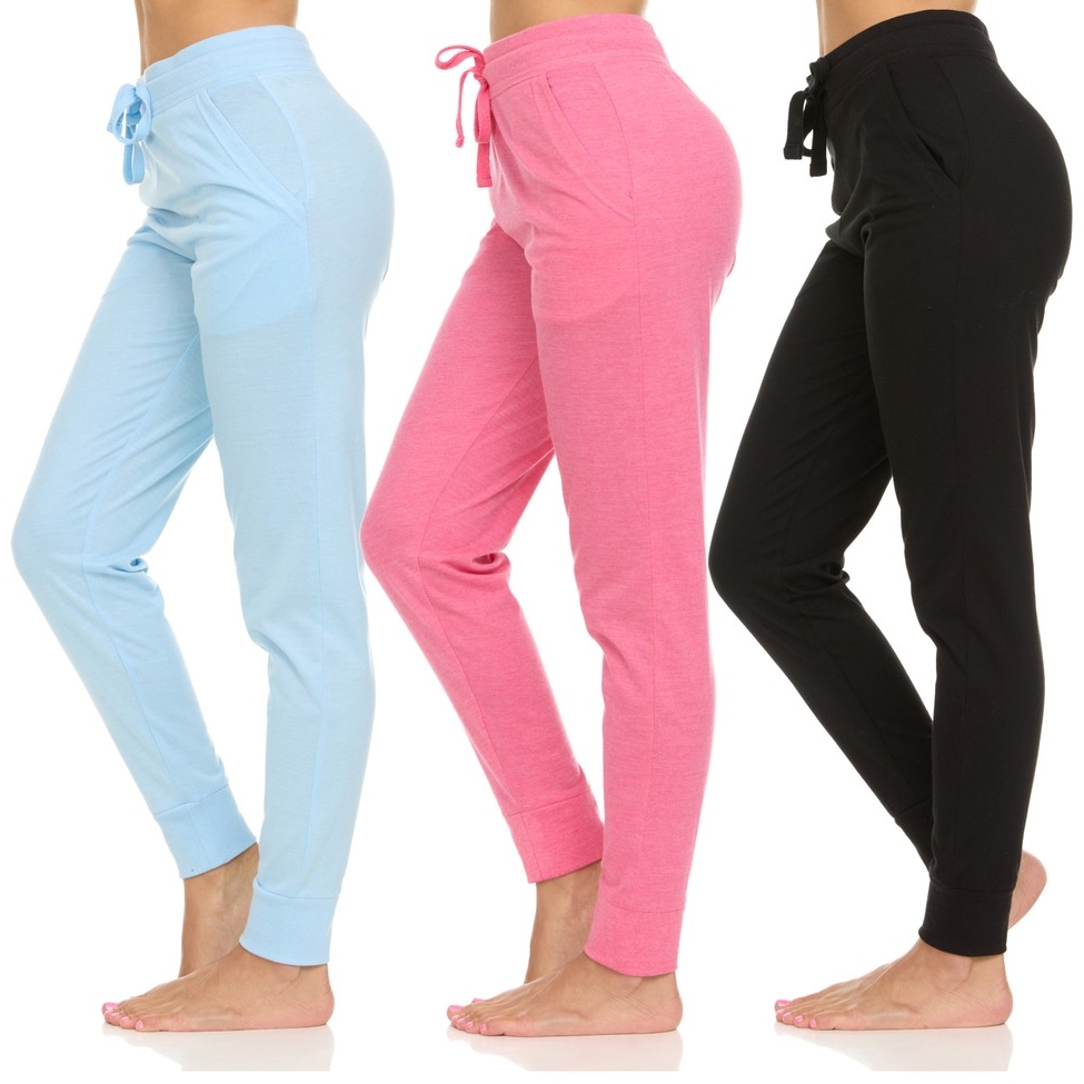 A set of three leggings with pockets in light blue, pink, and black, featuring a drawstring waistband and slim fit style.