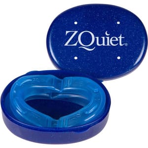 A blue anti-snoring mouthpiece with a matching storage case, both labeled \“ZQuiet.\“