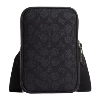 Black crossbody bag with embossed pattern and zipper closure on the side.