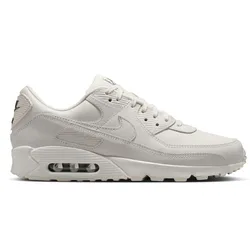 A white athletic shoe featuring a visible air cushioning unit in the midsole and a stitched swoosh logo on the side.