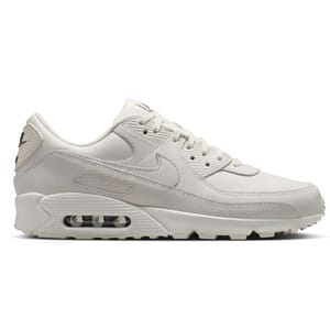 A white athletic shoe featuring a visible air cushioning unit in the midsole and a stitched swoosh logo on the side.