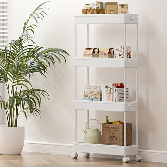 White four-tier rolling storage cart with books, a watering can, and decorative items.
