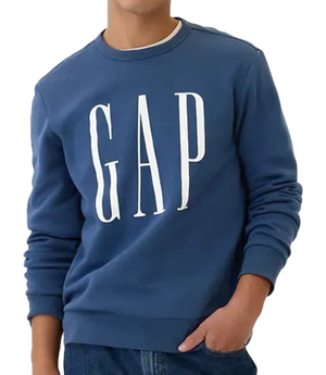 A blue sweatshirt featuring a large, white \“GAP\“ logo on the front, paired with blue jeans. The design is simple and casual, ideal for everyday wear.
