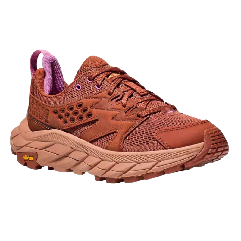 A red and pink trail running shoe with a mesh upper, textured midsole, and Vibram outsole, featuring purple accents and a pull tab.