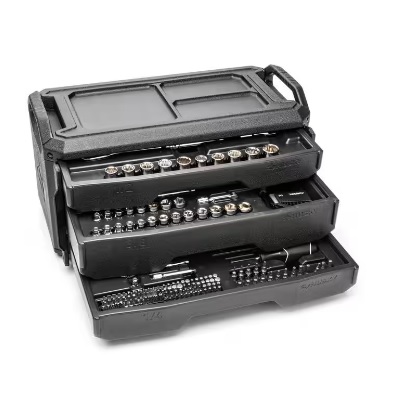 A Husky mechanics tool set in a black, portable case with multiple tiers displaying an organized assortment of sockets, ratchets, and wrenches.