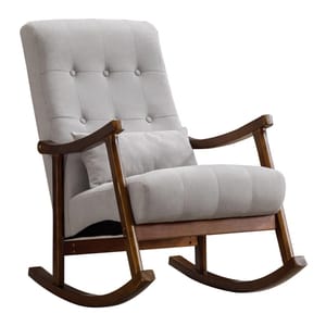 A gray rocking chair with tufted upholstery and wooden frame, featuring a cushion for added comfort.