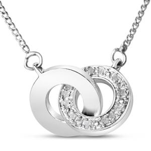 A necklace featuring two interlocking circles, one polished and the other adorned with small diamonds totaling 1/4 carat, crafted in a silver or white gold finish.
