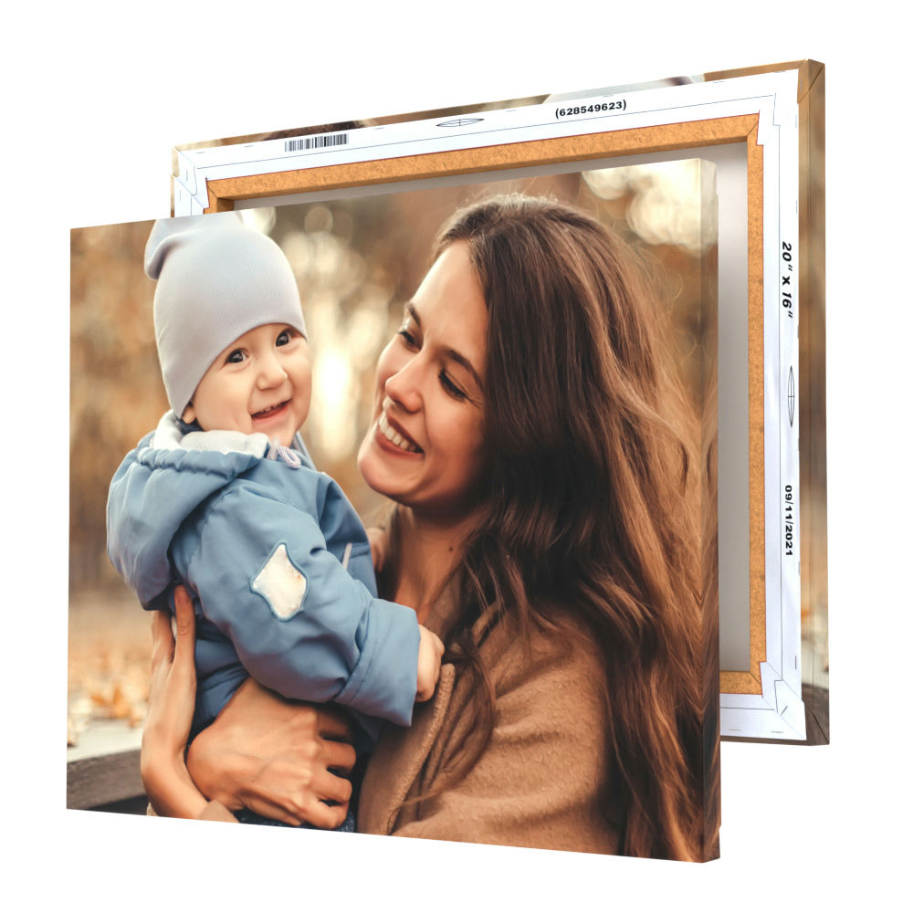 A canvas print featuring a photo of a woman holding a smiling baby.