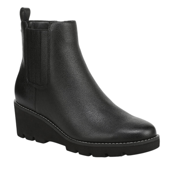Black ankle boot with a wedge heel and textured finish, featuring elastic side panels for easy slip-on wear.
