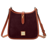 Burgundy crossbody bag with tan leather trim, gold hardware, and a Dooney & Bourke logo at the front. Features an adjustable strap and a top flap closure.