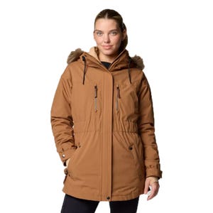 The Columbia Payton Pass Jacket is a brown, insulated winter coat featuring a faux fur-lined hood, dual chest zipper pockets, and adjustable sleeve cuffs for warmth and functionality.