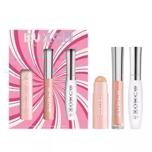Buxom Lolli-Plump Dreams kit with a pink and white swirled box includes a lip balm, shimmery peach gloss, and a clear \“Plump Shot\“ lip serum.