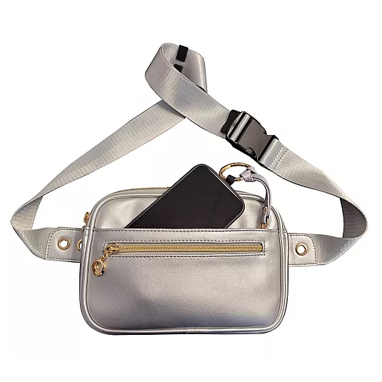 A silver fanny pack with a black buckle strap, featuring a front zippered pocket and a larger main compartment holding a black smartphone.