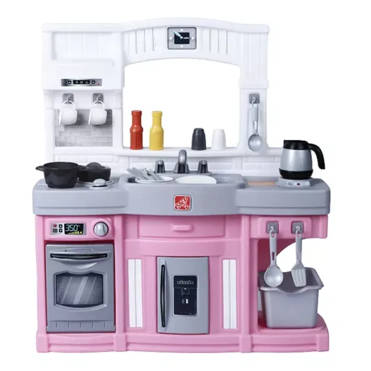 Toy kitchen set with a pink and gray color scheme, featuring a sink, stove, oven, coffee pot, utensils, and condiment bottles.