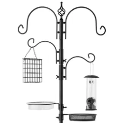 A multipurpose black metal bird feeding station with hooks for feeders, a suet cage, a water dish, and a seed tray.
