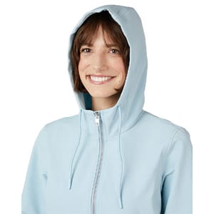 A person wearing a light blue hoodie with the hood up, featuring a front zipper and drawstrings.