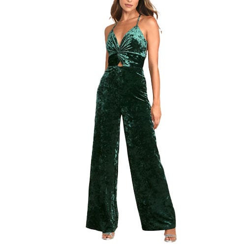 Velvet emerald-green jumpsuit with wide-leg trousers, a twisted front with cutout detail, and spaghetti straps.