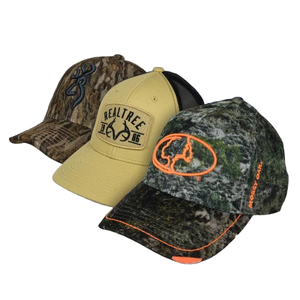 Three baseball caps with outdoor-themed designs: one in a camouflage pattern with a black logo, another in beige with a Realtree logo, and the third in a green camo pattern with an orange border and logo.