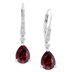 Silver earrings featuring teardrop-shaped red gemstones with small, round accents and lever-back closures.