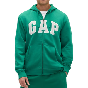 Green zip-up hoodie with \“GAP\“ in large white letters on the front, featuring a drawstring hood and front pockets.