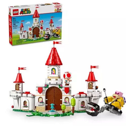 LEGO Super Mario set featuring Peach's Castle with red turrets, a chain chomp, and characters including a Toad and a small yellow buildable figure. Box art is visible in the background.