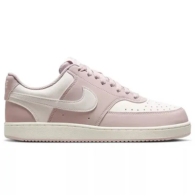 A low-top sneaker with a pink and white color scheme, featuring a perforated toe box and signature swoosh design.