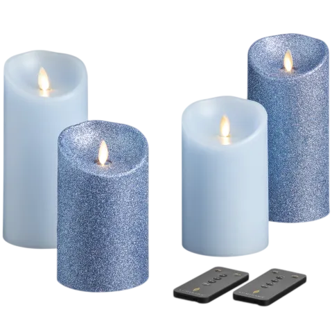 Four LED flameless candles, two with a blue glitter design and two with a plain blue finish, each with a flickering flame effect, accompanied by two remote controls.