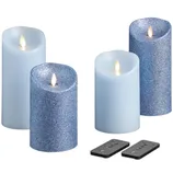 Four LED flameless candles, two with a blue glitter design and two with a plain blue finish, each with a flickering flame effect, accompanied by two remote controls.