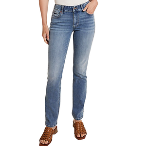 Classic Mid Rise Slim Straight Jeans feature a mid-rise waist, slim fit through the hips and thighs, and straight legs. They have a light blue wash with subtle fading and whiskering.