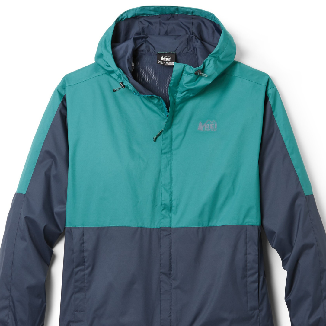 A teal and navy hooded windbreaker jacket with the REI Co-op logo on the left chest.