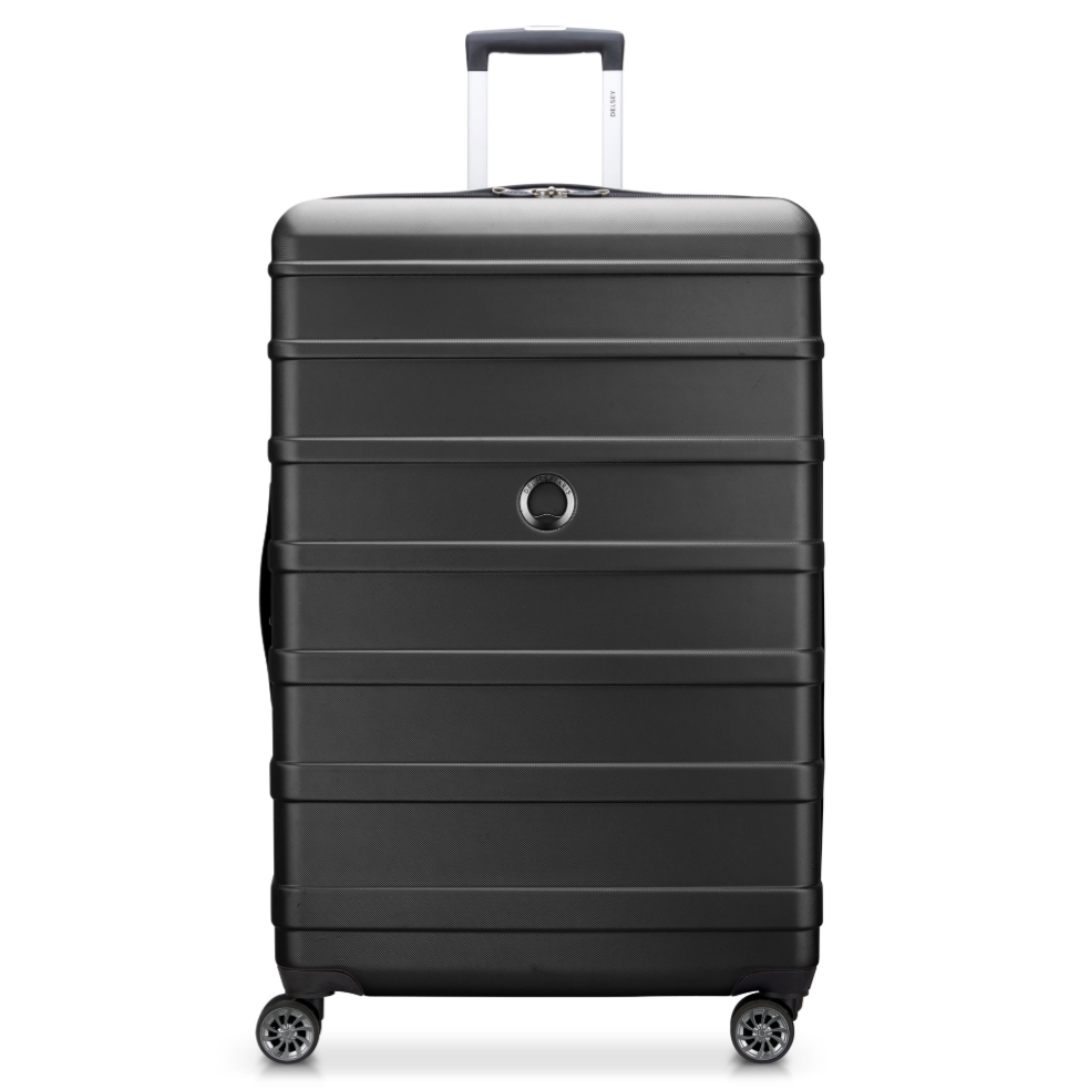 A black hardshell suitcase with four spinner wheels and a telescopic handle, featuring horizontal grooves and a circular logo near the center.