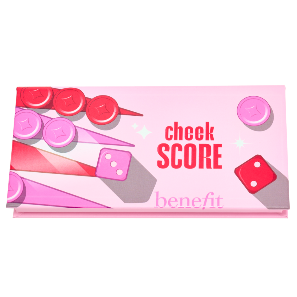 Pink packaging features the words \“cheek SCORE\“ and the brand name \“Benefit\“ alongside game token imagery, likely indicating a makeup palette for cheeks.