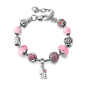 A silver charm bracelet featuring pink and silver beads and charms, including hearts, flowers, and the word \“LOVE\“ with a small pink stone. It has a lobster clasp and an adjustable chain for sizing.